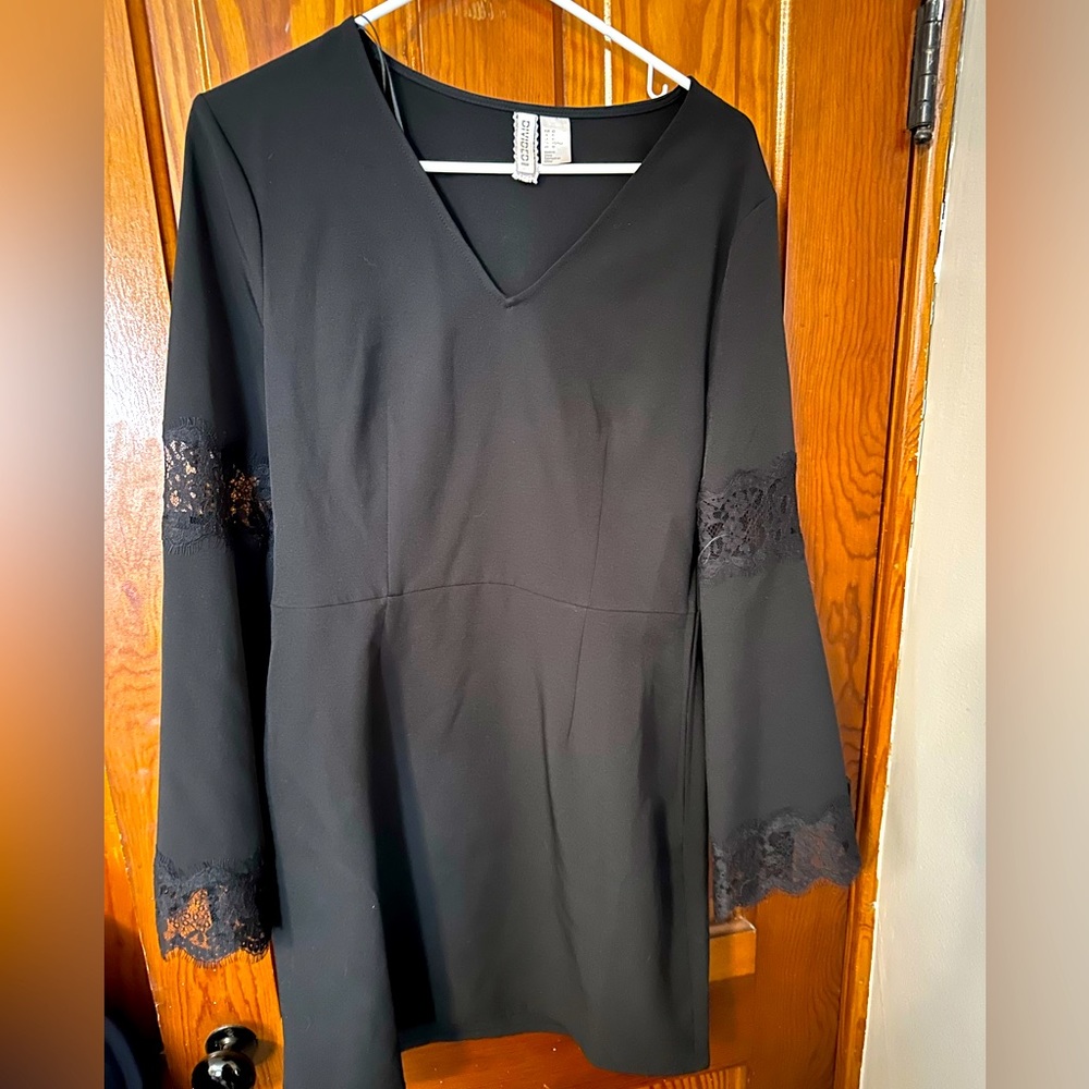 H&M Divided Black Dress with Flared Sleeves and Lace Details